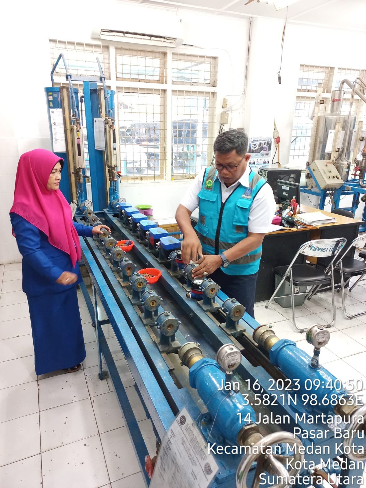 Smart water meter testing and calibration line